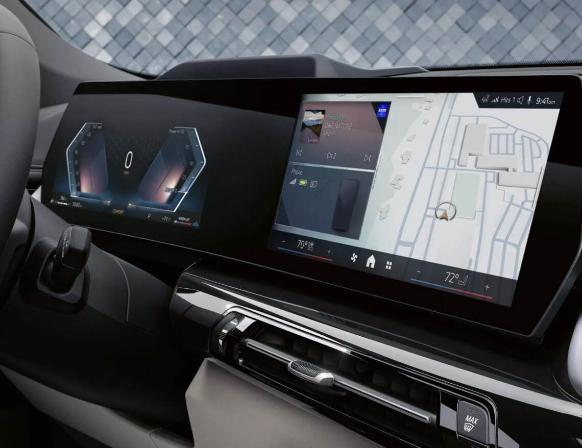 Interior detail close-up shot of BMW X1 infotainment navigation touchscreen.